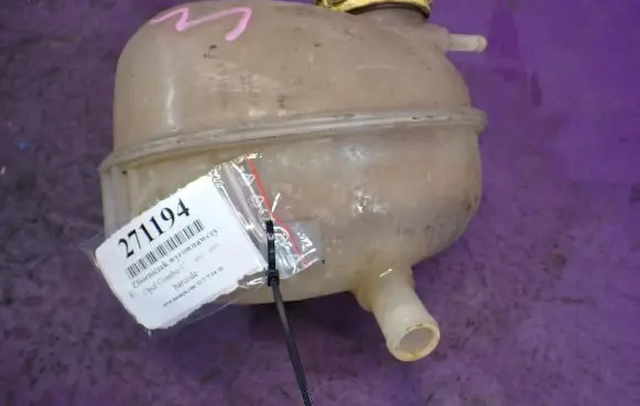 Opel Combo C Coolant expansion tank/reservoir 09128766