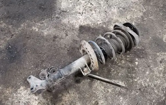 Front shock absorber with coil spring