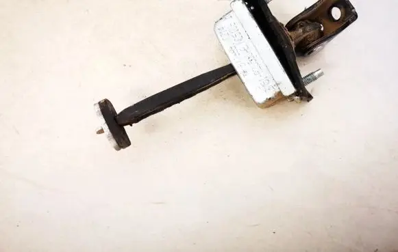 Rear door check strap stopper