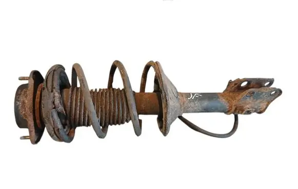 Subaru Forester SF Front shock absorber with coil spring 