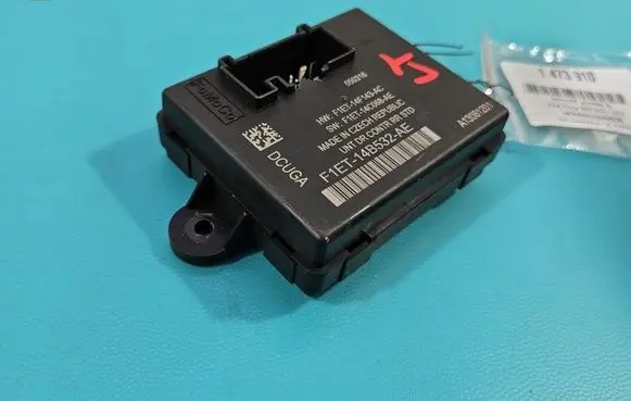 Ford Focus Central body control module F1ET-14B532-AE IMPRK1473910