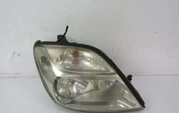 Renault Scenic I Headlight/headlamp 7701047600