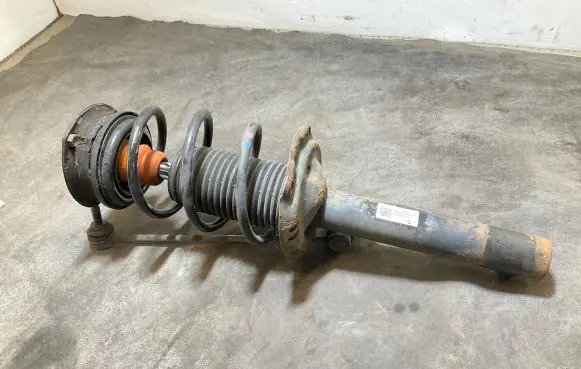 Front shock absorber with coil spring