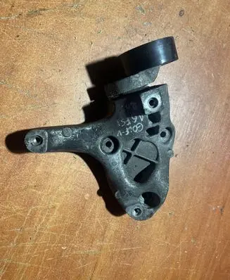Volkswagen Golf V A/C compressor mount bracket 1K0260885B