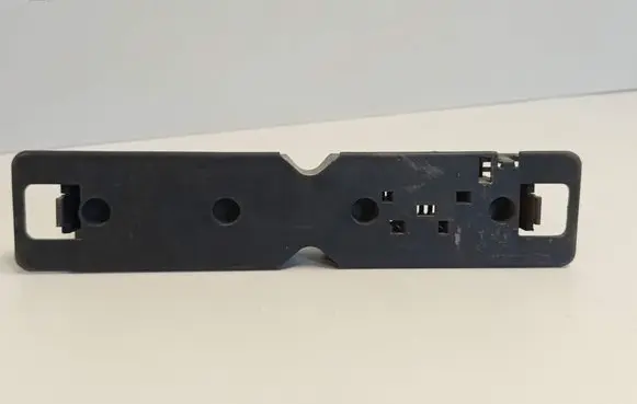 Tail light bulb cover holder