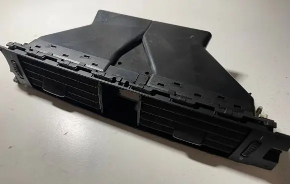 Dash center air vent grill
