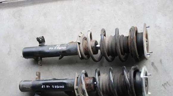 Mini Cooper Countryman R60 Front shock absorber with coil spring 111KM