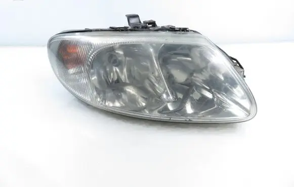 Chrysler Voyager Headlight/headlamp 04857702AB