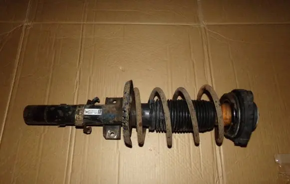 Volkswagen Polo Front shock absorber with coil spring