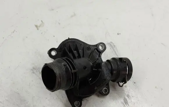 Thermostat/thermostat housing