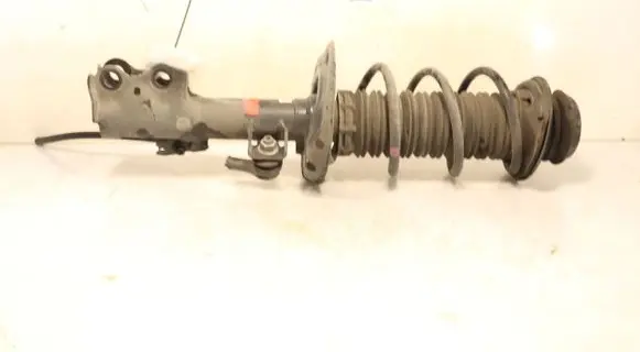 Toyota Yaris XP210 Front shock absorber with coil spring
