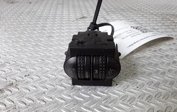 Headlight level height control switch