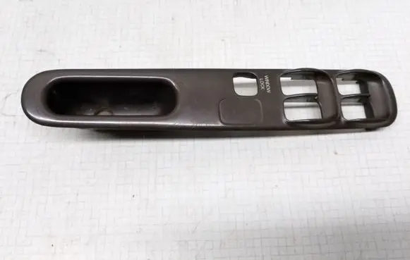 Mitsubishi Galant Front door window switch trim 