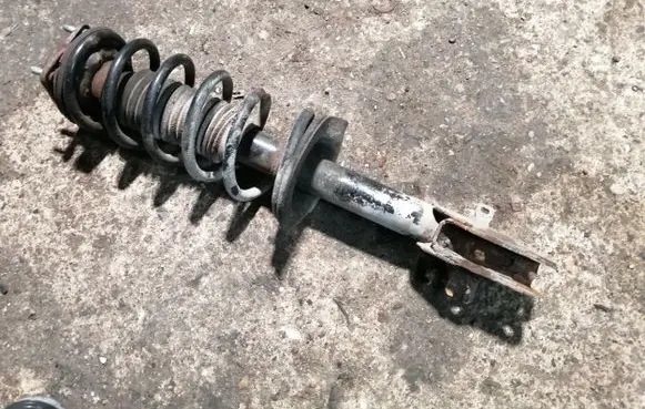 Front shock absorber with coil spring