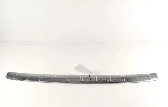 Rear bumper trim bar molding
