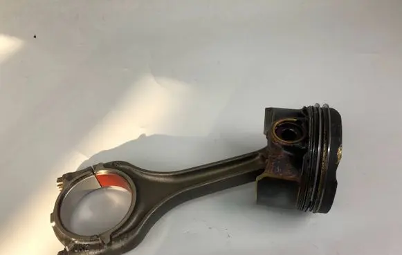 Piston with connecting rod