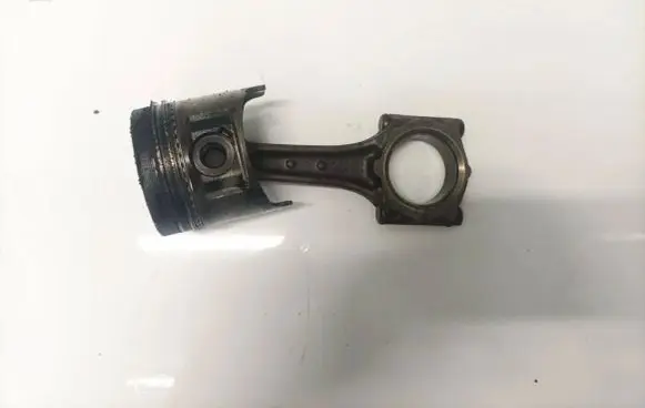 Opel Combo B Piston with connecting rod