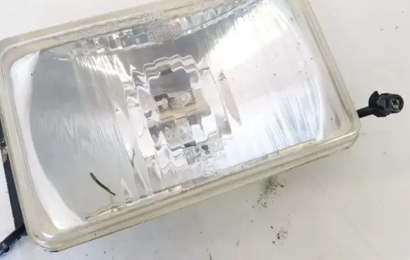 Volkswagen Polo II 86C 2F Headlight/headlamp 301127587