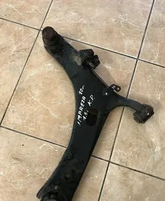 Subaru Impreza III Front lower control arm/wishbone
