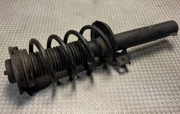 Front shock absorber with coil spring