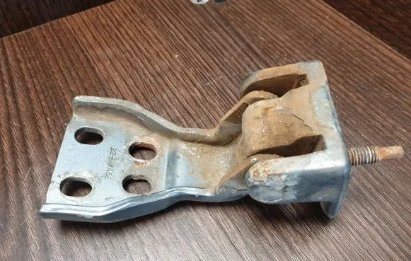 Front door lower hinge