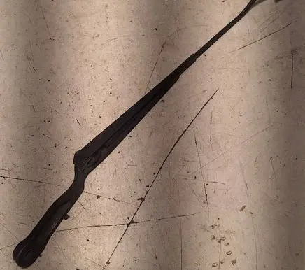 Front wiper blade arm