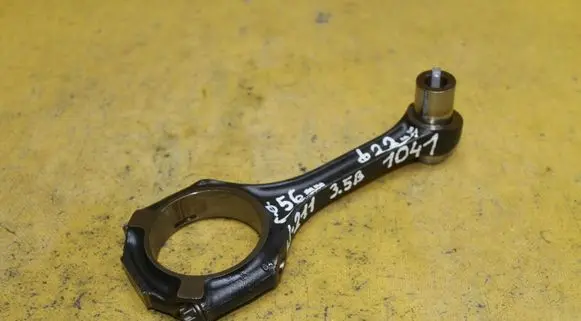 Piston with connecting rod