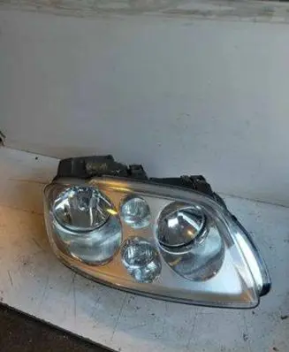 Volkswagen Touran I Headlight/headlamp 1T0957006F