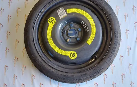 Volkswagen Golf V R18 spare wheel 1K0601027B