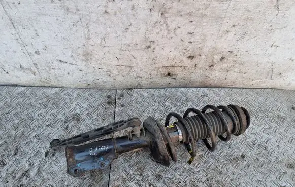 Chevrolet Cruze Front shock absorber with coil spring 13337808 13333964