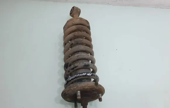 Nissan Navara D40 Front shock absorber with coil spring