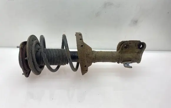 Subaru Legacy Front shock absorber with coil spring