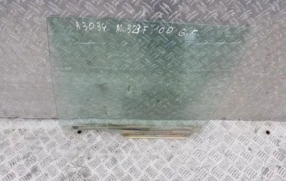 Mazda 323 F Rear door window glass 
