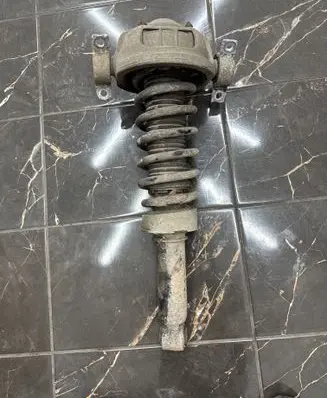 Volkswagen Touareg I Rear shock absorber with coil spring 