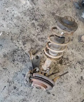 Volkswagen Touran II Front wheel hub spindle knuckle 1T0413031JK