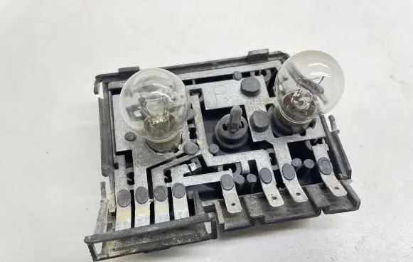 Audi A6 S6 C4 4A Tail light bulb cover holder THK81