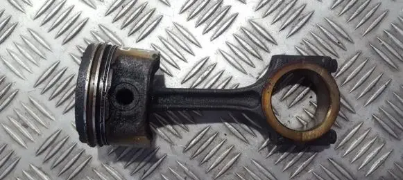 Piston with connecting rod