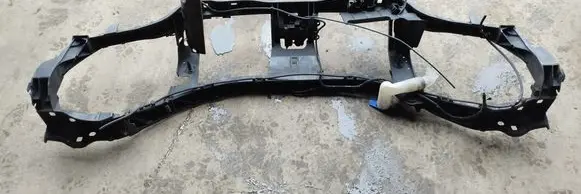 Top upper radiator support slam panel