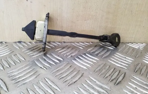 Mazda 3 I Front door check strap stopper