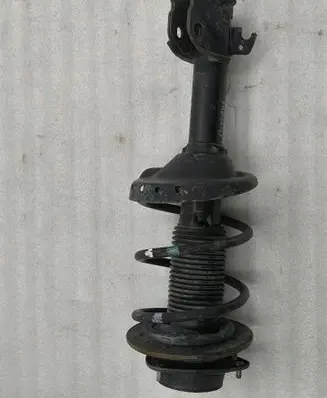 Subaru Legacy Front shock absorber/damper 20310AJ000
