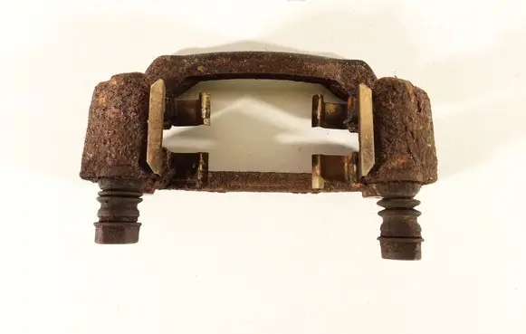 Subaru Legacy Brake caliper pad carrier rear 