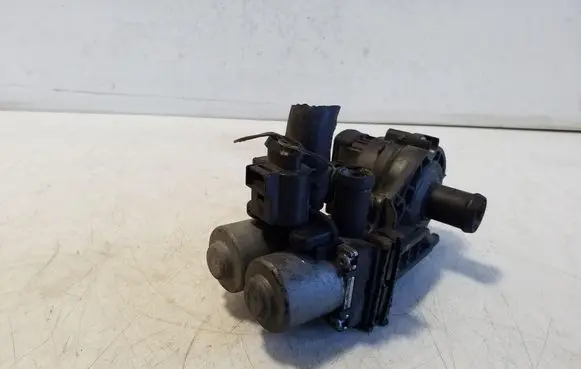 Coolant heater control valve