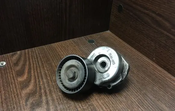 Fiat Fiorino Timing belt/chain tensioner 55244469