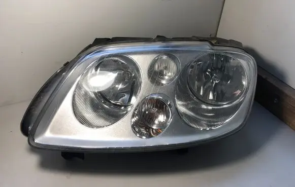 Volkswagen Touran I Headlight/headlamp 0301205201