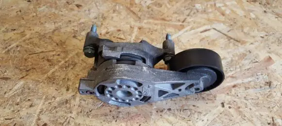 Volkswagen PASSAT B6 Alternator belt tensioner 06F903315