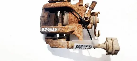 Opel Astra J Rear brake caliper 