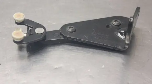 Sliding door lower roller guide/hinge