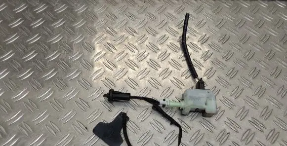 Fuel tank cap lock motor