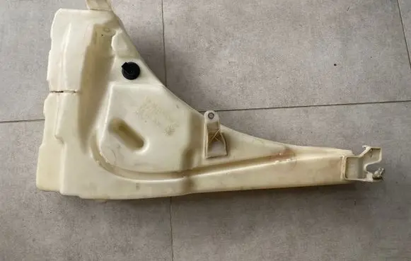 Volkswagen Touareg I Lamp washer fluid tank 7L0955453