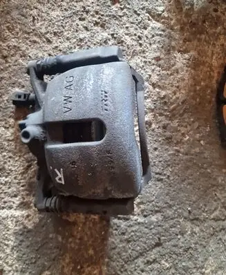 Volkswagen Touran III Front brake caliper